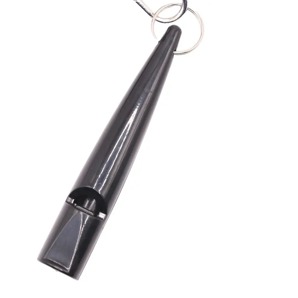 Training whistle for dogs with a leash