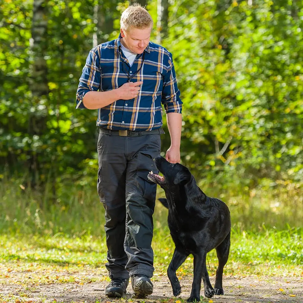 Training whistle for dogs with a leash